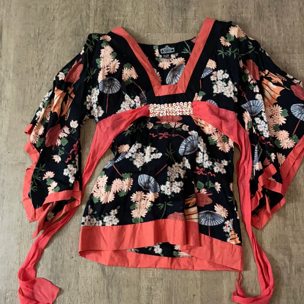 Women’s blouse with beautiful prints. Flare sleeves